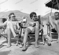 Negative-Woman-Man-Sunbathing-