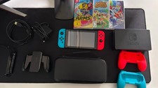 Nintendo Switch Bundle mit 3 Spielen, 2 Controllerhalterungen und Tragetasche