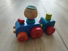 Haba Holz Zug Auto mit Figur und Anhänger