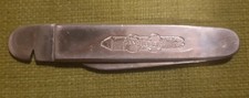 Vintage, 50er-60er Jahre. Zigarrenschneider Handelsgold Messer mit Lederetui rot