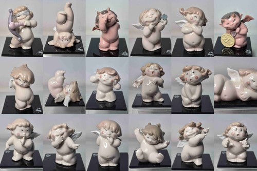 Nao lladro cheeky cherub - lladro,