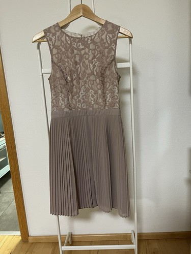 Cocktailkleid bestickt mit - &,