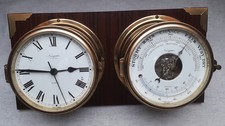 Große Schiffsuhr und Barometer auf Edelholzbrett. Fabrikat Navigator.