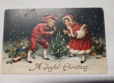 AK Historische Weihnachtskarte ; England Prägedruck Kinder mit Weihnachtsbaum