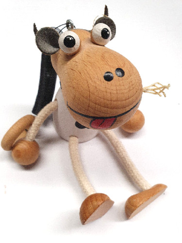 Schwingfigur kuh aus holz - kuh,