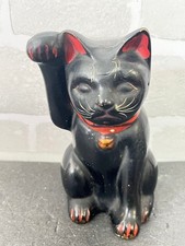 Antikes schwarzes Maneki Neko