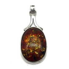 925/- Silber Anhänger, Bernstein, Cabochon, 52 mm lang, guter Zustand.