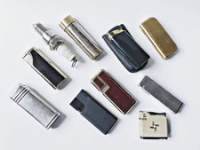 6) 10 alte Gasfeuerzeuge