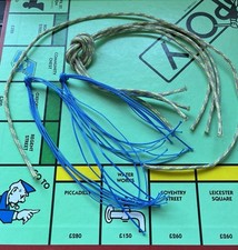 Ein Satz Optimist Segeljolle