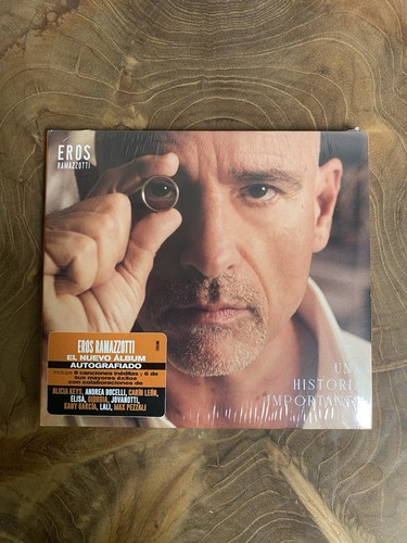 Eros ramazzotti signed una - eros,