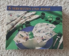 6 Servietten und -Ringe