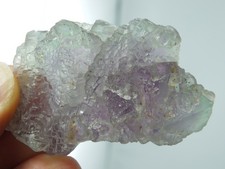 Fluorit Oktaeder überwachsen (1559)