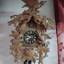 kuckucksuhr mit drei vogel und  einem Nest mit Küken Kuckucksuhr Mit Nachtabscha