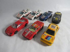 BURAGO 7 PKW-Lamborghini-Porsche 928+911-Ferrari F 40+ GTO-Peugeot-Konvolut