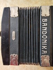 Bandonika Reparaturbedürftig