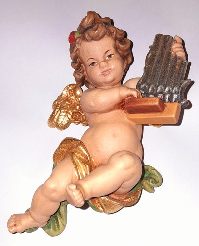 Nackter engel mit handorgel - ,