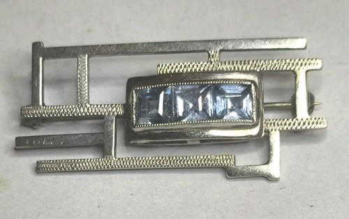 Designerbrosche mit blauen