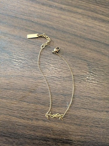 Saint laurent ysl logo gold - saint,
