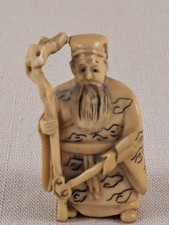 Japanische Netsuke-Figur – feine Handarbeit mit Wolkenmotiv – signiert
