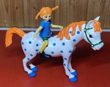 Pippi Langstrumpf mit Pferd
