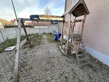 Spielhaus aus Holz mit Schaukel &Rutsch gebraucht aber geliebt für Selbstabholer