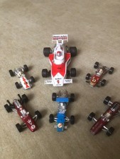 6x alte Formel 1 Rennwagen aus