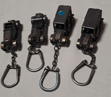 4 mal Oldtimer Schlüsselanhänger Miniatur Spielzeug Rambler Stutz Morris Vintage