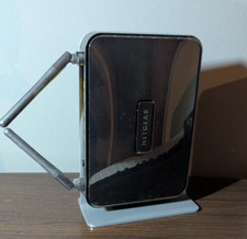 Netgear N300 Wireless ADSL2+ Modem Router DGN2200B + Netzteil