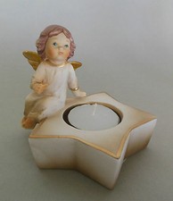 Engel mit Teelicht links