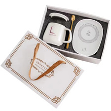 Geschenkset: Kaffeetasse aus Keramik mit elektrischem Wärmer und Löffel
