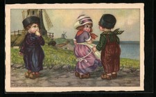 Künstler-AK A. Bertiglia: Holländische Frau und zwei Männer in Holzschuhen, Im  