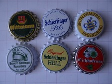 6 verschiedene Kronkorken aus