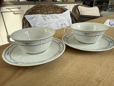 2 Teetassen mit Untere