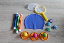 Tauchspielzeug Tauchstäbe Fische Kescher Badehaube blau Propeller Smilies