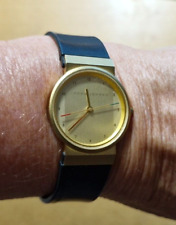 Jacob Jensen Damenarmbanduhr analog goldfarben mit schwarzen Kautschukarmband