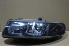 Frontscheinwerfer links 67742691 / 1M1941001D Seat Leon 1M Bj,00