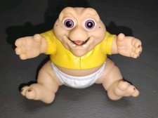 Spielfigur Baby Sinclair Die