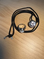 Leonardo Ring und Anhänger am schwarzen Band, Edelstahl, heller Glasstein