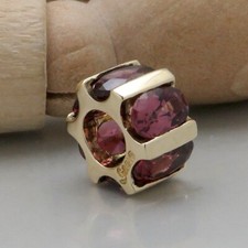 Anhänger Läufer mit Rubellit Besatz in 375/9K Gelbgold