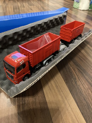 Conrad man abrollkipper mit - conrad,