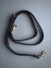 Coach lange Lederriemen für