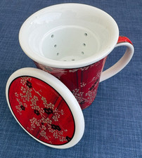 Ihr Teetasse mit Sieb und