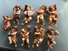 9 Engel aus Holzschnitzerei Größe ca 17cm x 7 cm