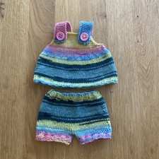Handgestrickte Kleidung f