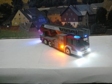 Modellauto HO 1:87 Feuerwehr 3 Achser Leiterwagen mit Super smd Led Beleuchtung