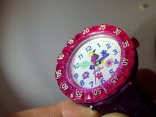 Flik Flak Kinderarmbanduhr lila – Blumenmotiv – neue Batterie, "Purple Garden"