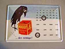 Blechschild Maggi Fleischbrüh Würfel mit Raben Kalender 20x30cm