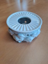 Ein Stövchen, so weiß wie