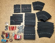 Konvolut - Carrera Universal Rennbahn Bahnteile Trafo 70er Jahre