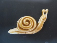Wachsornament, Wachskunst, Schnecke, braun, Kerze selbst gestalten